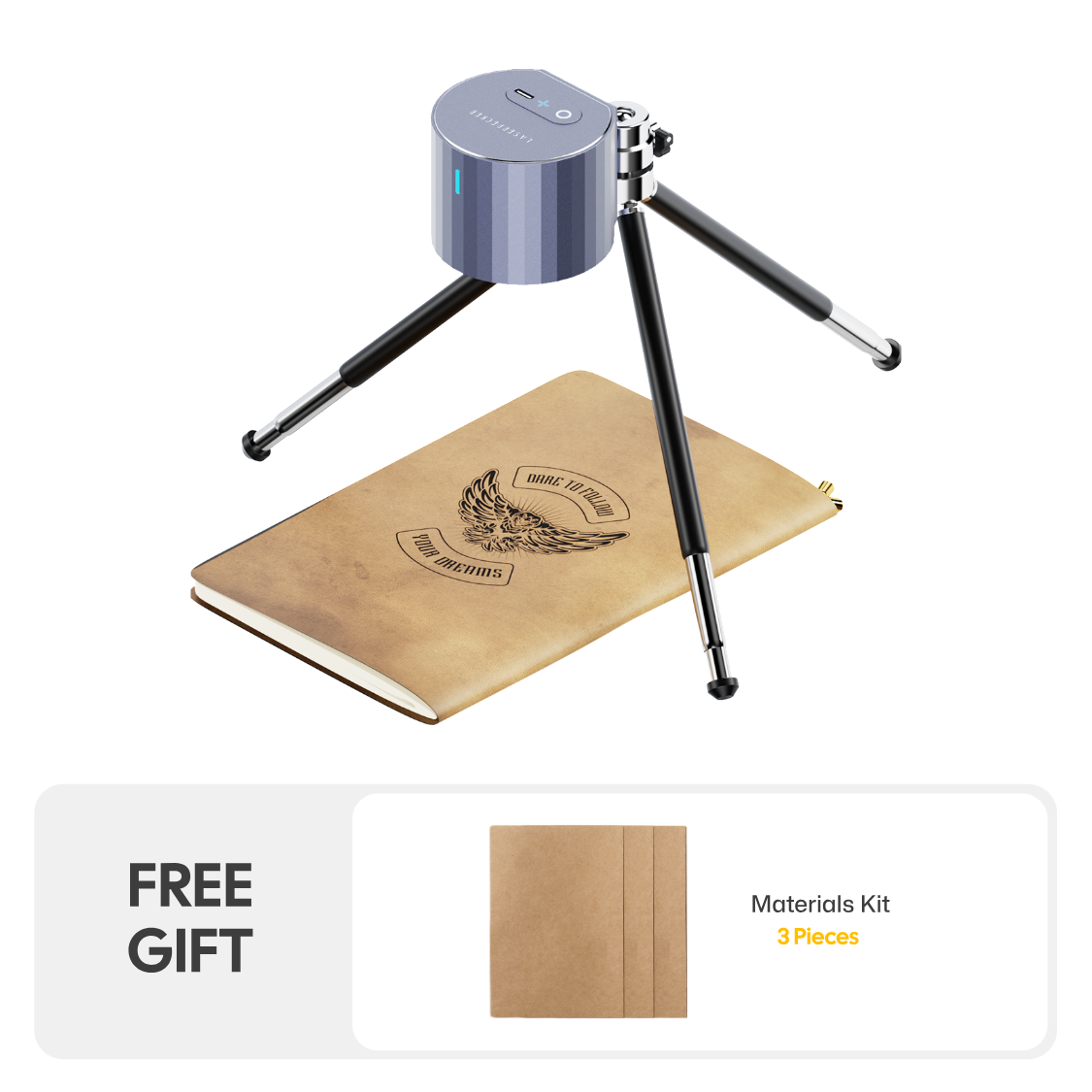 LaserPecker LP1 Pro portable cylindrical engraver mounted on a tripod, engraving a custom design onto a notebook cover, bundled with a free 3-piece materials kit for immediate creative use.