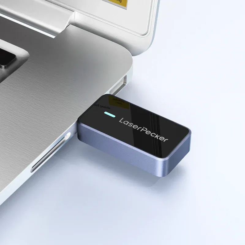 laserpecker bluetooth dongle plugged into laptop for wireless file transfer to laser engraver.