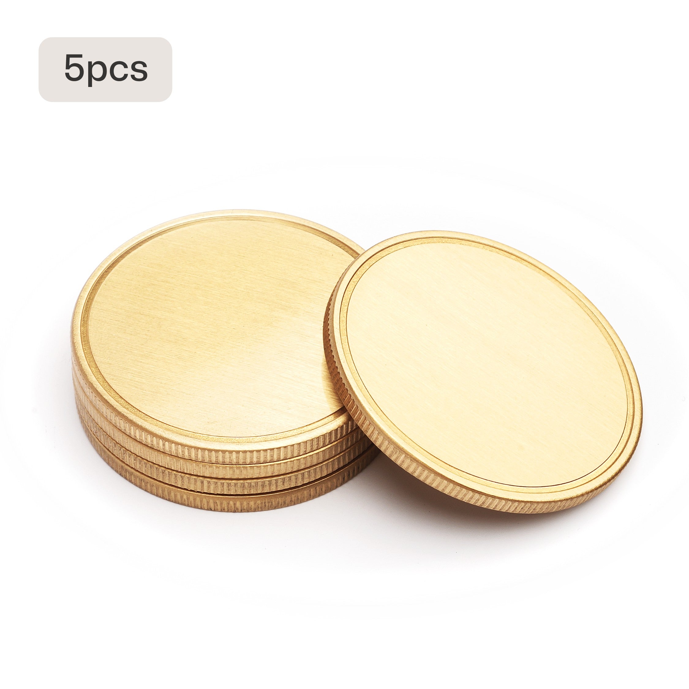 5 blank brass coins stacked for laser engraving bulk order for military units corporate awards.