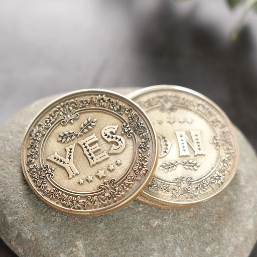 Pair of laser-engraved metal decision coins