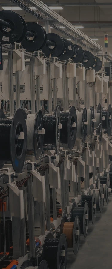 Commercial 3D print farm producing custom 3D printed products for laser engraving, branding, serial numbering, and personalized applications.