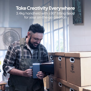 Portable LaserPecker laser engraver being used on-site, weighing just 3.4kg with a ±90° tilting head for on-the-go creativity, with the slogan "Take Creativity Everywhere".