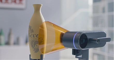 LaserPecker LP4 laser unit rotated with Rotary Extension for bottle engraving.