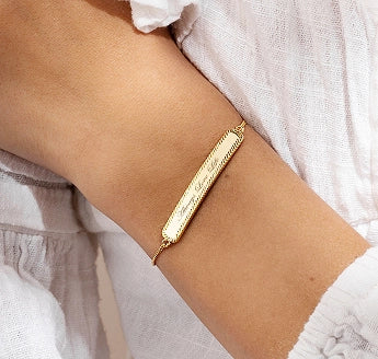 Custom engraved bracelet with a personalized text inscription using LaserPecker LP4.