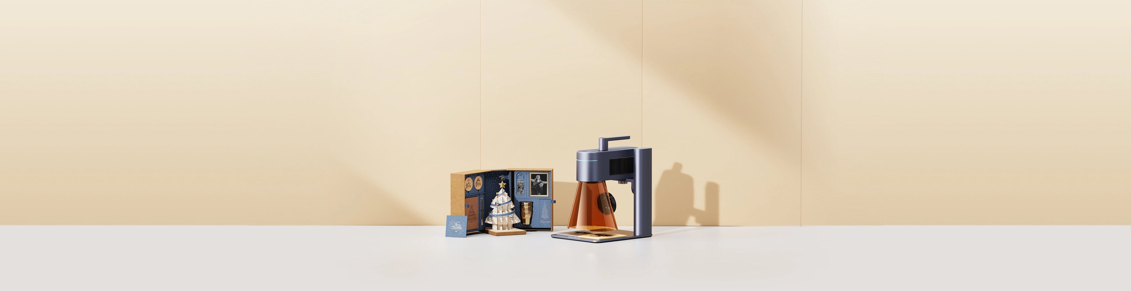 LaserPecker LP4 machine showcase surrounded by intricate multi-piece laser cut and engraved assembly models.