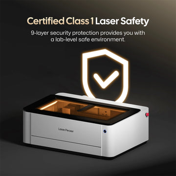LaserPecker laser engraver with Certified Class 1 Laser Safety, featuring 9-layer security protection to create a lab-level safe working environment, highlighted by a glowing shield icon for visual emphasis.