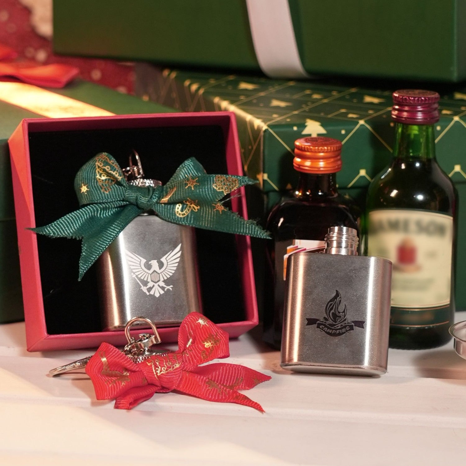 1 oz mini stainless steel flask keychain with custom laser engraved text and designs.

