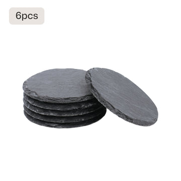 6 piece black slate coaster blanks stacked for laser engraving custom monogram housewarming gift.