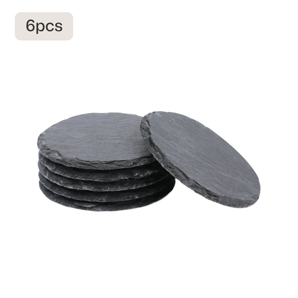 6 piece black slate coaster blanks stacked for laser engraving custom monogram housewarming gift.