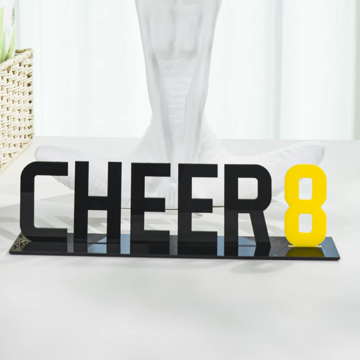 Laser cut acrylic signage from matte opaque sheet.