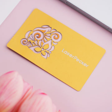 multicolor aluminum business card blanks with sample laser engraved logo text for personalization.
