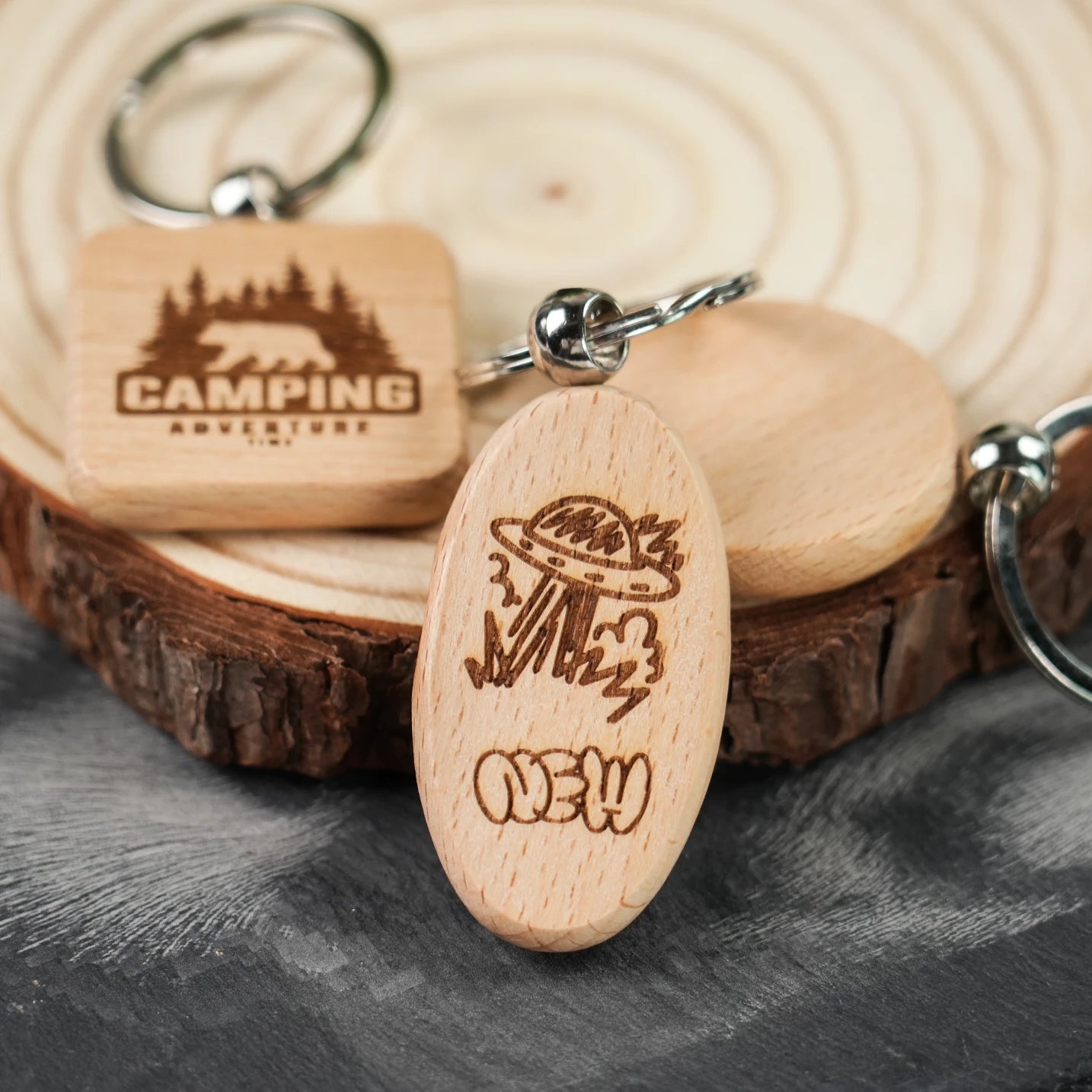 mixed wooden keychain blanks with laser engraved names and designs personalized diy craft samples.