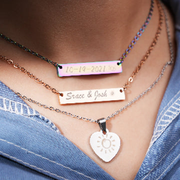 stainless steel horizontal bar necklace worn on model for laser engraving minimalist everyday jewelry.