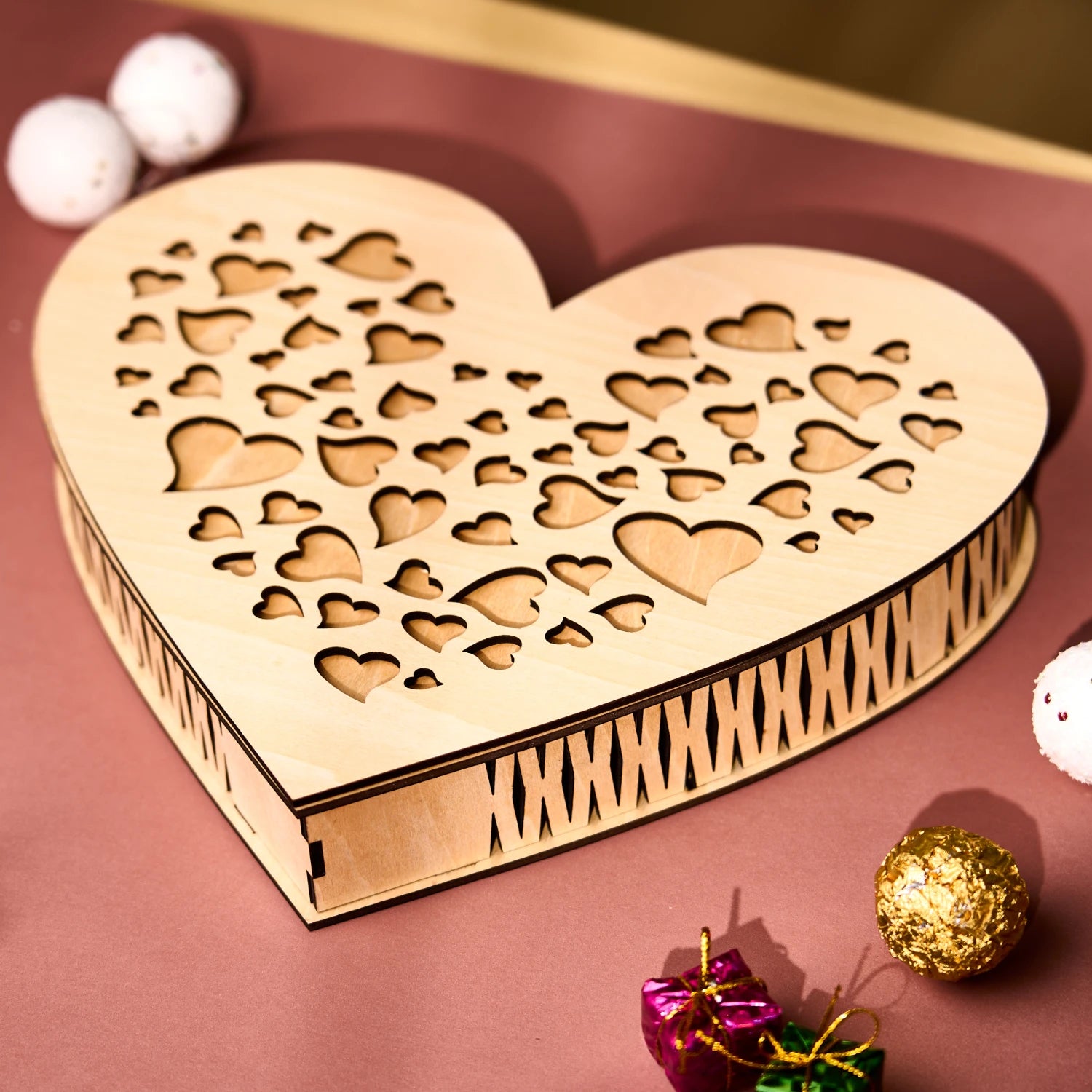Laser cut wooden heart-shaped box from 3mm basswood plywood sheet.
