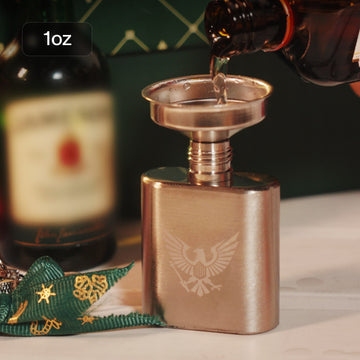 laserpecker brass hip flask with laser engraved eagle emblem being filled with whiskey surrounded by bottles and bar decor.