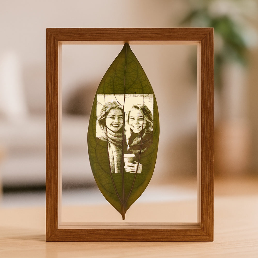 laser engraved cinnamon leaf ornament displayed in rustic photo frame christmas home decor personalized holiday gift.