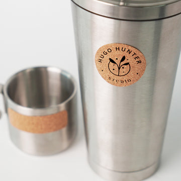 laser engraved round cork labels applied on mason jar lids for rustic pantry organization.