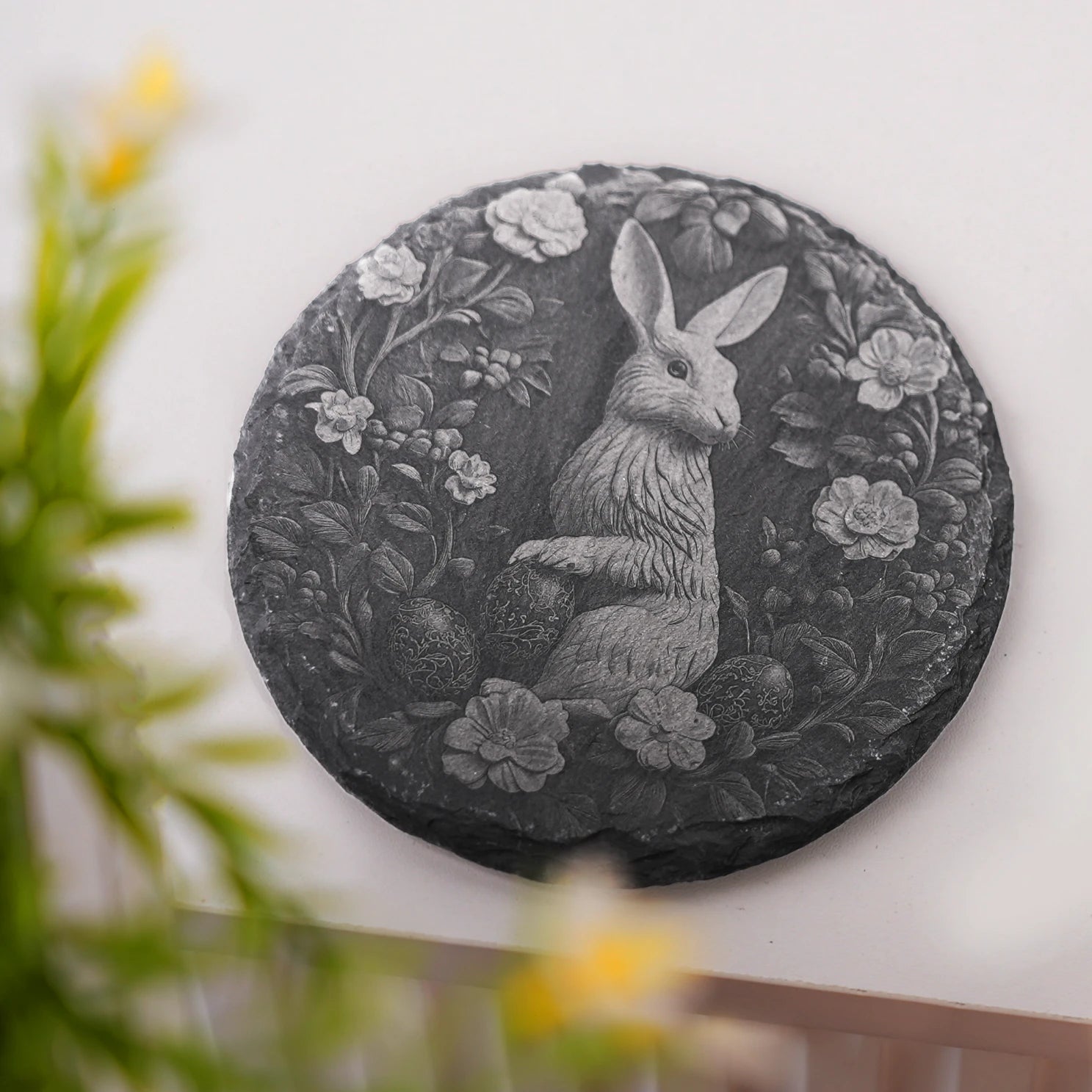 round slate coasters with laser engraved easter day patterns for holiday celebrations.