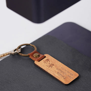 side view of walnut keychain blank showing 4mm thickness for laser engraving sturdy wood keyring.