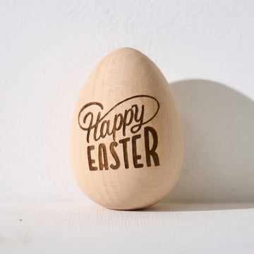 wooden easter egg blank painted with pastel colors for laser engraving spring holiday craft inspiration.