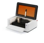 LaserPecker LX2 compact laser cutter with front-loading design saves workspace in small studios.
