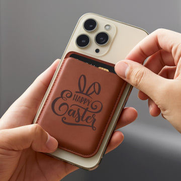 This image features a slim, brown faux leather phone wallet, laser-engraved with a festive “Happy Easter” design that includes playful bunny ears and decorative script. Attached to the back of a smartphone, it demonstrates both functionality and personalization, making it a charming, practical gift for the holiday that keeps cards and essentials close at hand.
