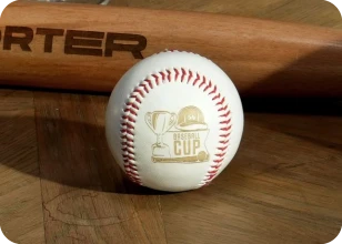 LaserPecker LP2 Plus with rotary extension engraving custom text and logos on baseball surface, 360° rotation for sports equipment personalization.