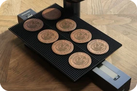 LP2 Plus slide extension batch engraves leather patches for custom branding and leather craft projects.