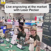 A Creators using LaserPecker machines to produce custom pet products at a craft fair.